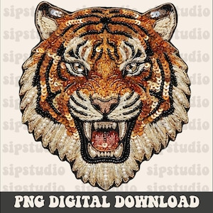 May include: A detailed tiger head design with orange, black, and gold sequins and beads. The tiger is roaring, with its mouth open, revealing teeth and a pink tongue. The design includes the text "PNG DIGITAL DOWNLOAD".