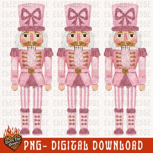 May include: Three identical nutcracker figures in a light pink color palette. Each figure wears a tall hat with a pink bow, a jacket with gold glitter accents, and striped trousers. The design features glittery pink and gold details throughout.