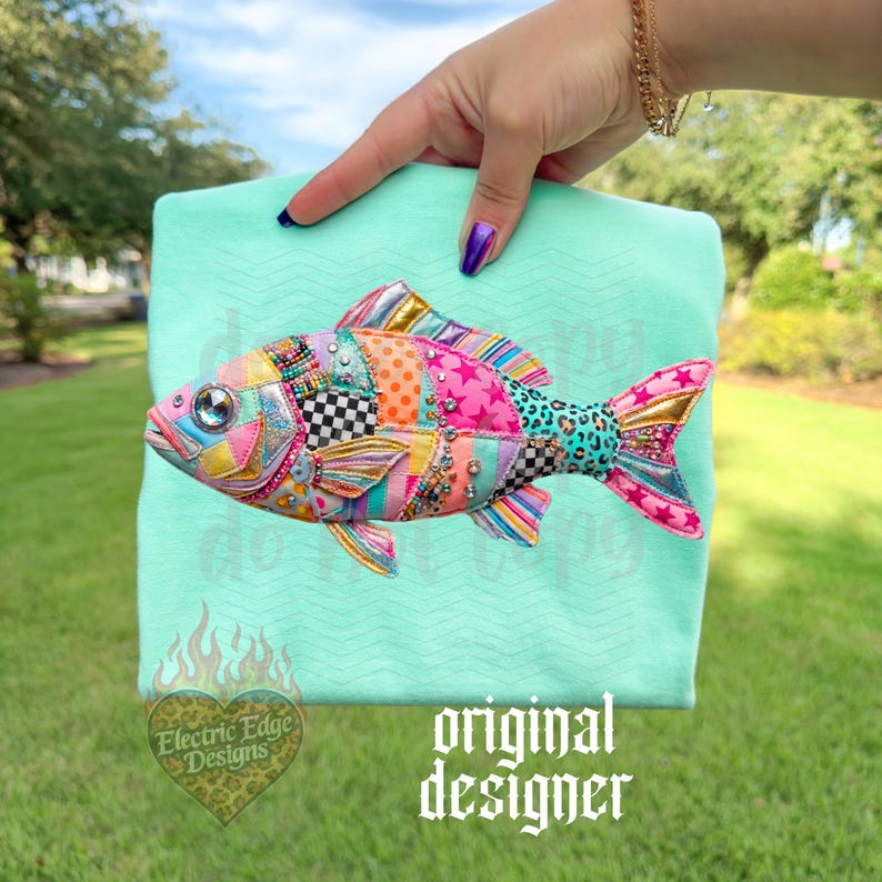 May include: A colorful, patchwork-style fish applique with pink, orange, and blue accents is displayed on a light teal fabric. The fish features a variety of patterns, including stars, polka dots, and checkered designs. The text "original designer" is visible.