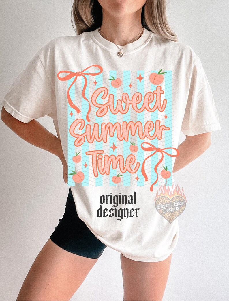 May include: Cream-colored t-shirt with a "Sweet Summer Time" graphic in coral and light blue. The design includes peaches and ribbons. The words "original designer" are printed below the graphic.