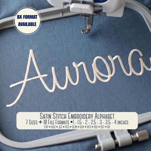 May include: An embroidery hoop holding blue fabric with the white stitched name Aurora. Text reads: BX FORMAT AVAILABLE, SATIN STITCH EMBROIDERY ALPHABET, 7 SIZES + 10 FILE FORMATS, 1 - 1.5 - 2 - 2.5 - 3 - 3.5 - 4 inches, EXP HUS JEF PES SEW SHV VP3 XXX DST BX.