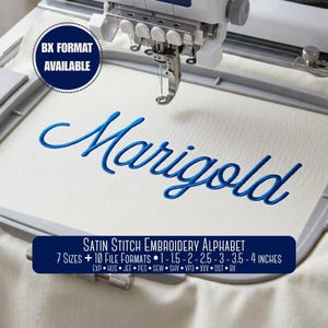 May include: An embroidery machine hoop holding white fabric with the blue embroidered word Marigold. A dark blue circular badge reads BX FORMAT AVAILABLE. A rectangular label states Satin Stitch Embroidery Alphabet, 7 Sizes, 10 File Formats, 1-1.5-2-2.5-3-3.5-4 inches, and lists file extensions.