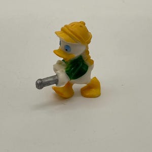 Figurka kolekcjonerska Kaczor Louie z bajki Disneya DuckTales - animowana postać promocyjna Kellogg's
