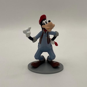 Figurka Disneya Goofy Mechanic: Postać z zestawu do zabawy na stacji benzynowej do domku dla lalek dla dzieci