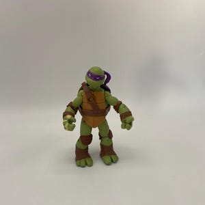 Figura de acción de Donatello de las Tortugas Ninja de Viacom (2012) - Juguete coleccionable suelto