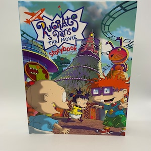 Cuento de la película Rugrats en París de Nickelodeon (año 2000): un cuento de aventuras infantil de dibujos animados.
