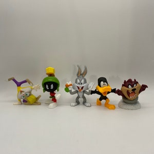 Zabawki Happy Meal z McDonald's Looney Tunes: Bugs Bunny, Taz, Daffy Duck i Marvin Martian Collectible Set