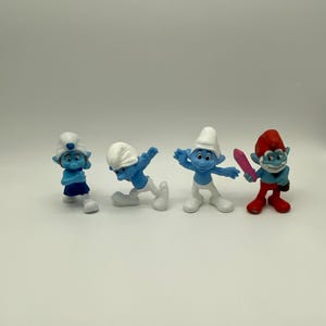 Kolekcja zabawek Happy Meal z McDonald's Smurfs z 2013 r.: kultowe niebieskie postacie Peyo z filmu