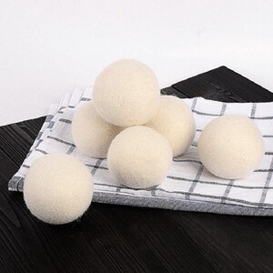 Merino Wool Dryer Balls 4 pieces and a bag image 5