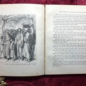 May include: A black and white illustration of a group of people standing in a doorway. The people are dressed in long robes and are looking at a child standing in front of them. The text "He took a child and set him in the midst of them." is printed below the image.