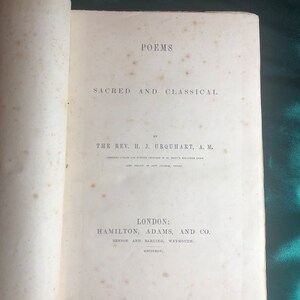 May include: A book titled "Poems Sacred and Classical" by The Rev. H. J. Urquhart, A.M.  Published in London by Hamilton, Adams, and Co. and Benson and Babling, Weymouth in 1863.