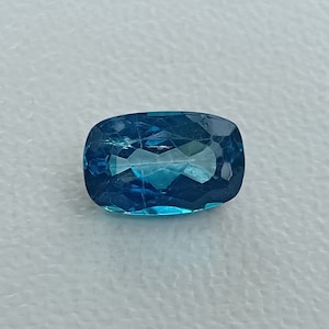 5.87 crt. Topaz. Natural. Facet. London Blue Color. 13.03 x 8.33 x 6.09 mm. approximately.