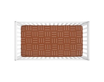 rust mudcloth crib sheet