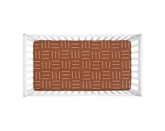 rust mudcloth crib sheet