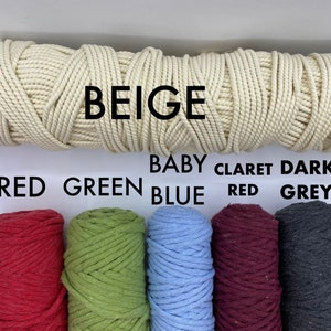 May include: A selection of colorful macrame cords. The top cord is beige, with the word "BEIGE" above it. Below are spools of red, green, baby blue, claret red, and dark grey cords. The colors are labeled with their names.