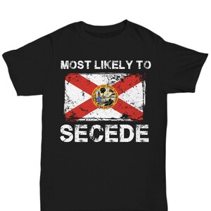 May include: Black t-shirt with a distressed Florida state flag and the text "Most Likely to Secede".