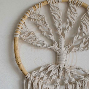 Macrame tree of life hanging on a rattan hoop with 3mm macrame cord. Long fringe, multiple leaves.