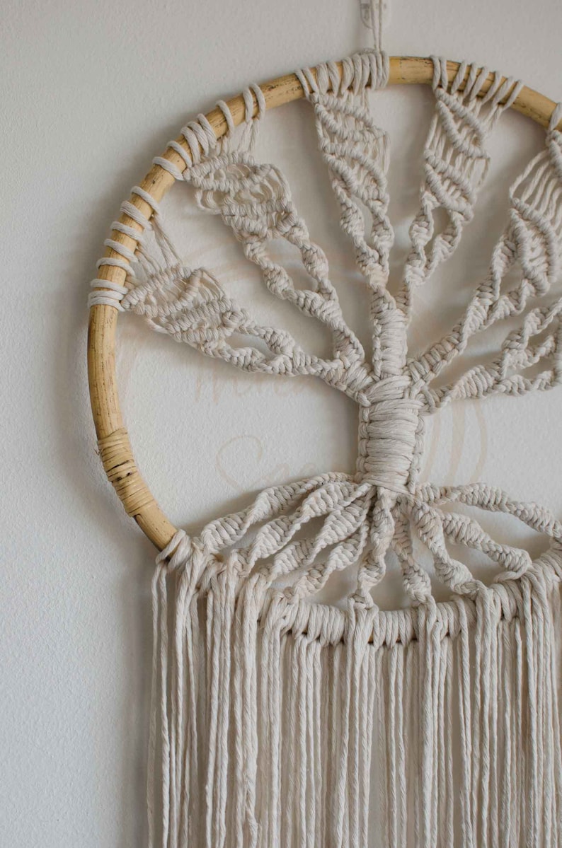 Macrame tree of life hanging on a rattan hoop with 3mm macrame cord. Long fringe, multiple leaves.