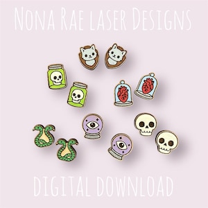 May include: A collection of wooden pins with a spooky theme. Designs include skulls, cats, hearts in bell jars, snakes, and crystal balls. The text "NONA RAE LASER DESIGNS" and "DIGITAL DOWNLOAD" are also visible.