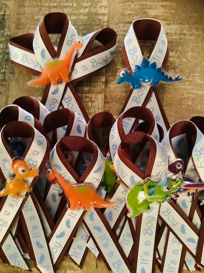Dinosaur \u201cit\u2019s a boy\u201d Baby Shower Pins