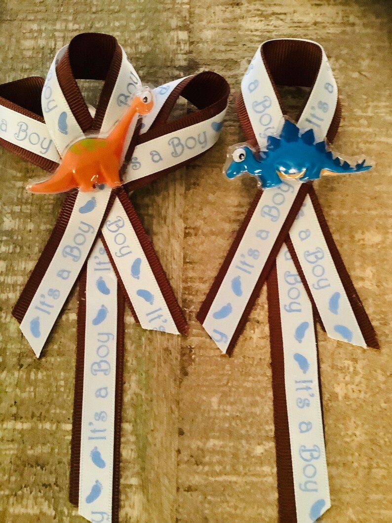 Dinosaur \u201cit\u2019s a boy\u201d Baby Shower Pins