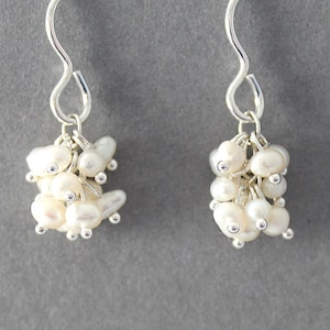 A pair of freshwater seed pearl earrings