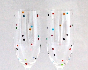 A pair of smartie dot champagne flutes