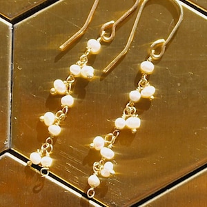 Gold & pearl chain dangly earrings