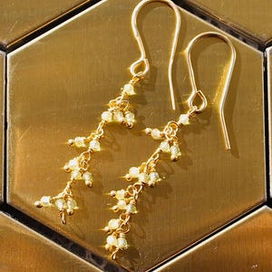 Gold & green peridot chain dangly earrings