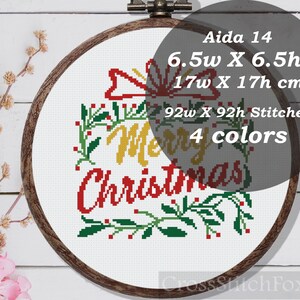 May include: Aida 14 count cross stitch pattern of a red and yellow "Merry Christmas" message with green holly and red berries. The pattern is 6.5 inches wide by 6.5 inches high and uses 4 colors.