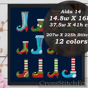 Puede incluir: Patr&oacute;n de punto de cruz para zapatos de duendes. El patr&oacute;n es para tela Aida de 14 hilos y mide 37,5 cm de ancho por 41 cm de alto. El patr&oacute;n utiliza 12 colores y tiene 207 puntos de ancho por 225 puntos de alto.