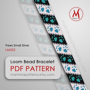 Peut inclure: Un modèle de bracelet en perles à tisser avec un motif de patte d'animal en perles noires, blanches, turquoise et argentées. Le modèle s'appelle "Paws Small Silver" et porte le code LM352. Le modèle est disponible en téléchargement PDF sur marivirrapatterns.etsy.com.