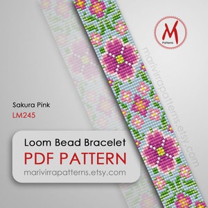 May include: A loom bead bracelet PDF pattern featuring a floral design in shades of pink, yellow, and green on a light blue background. The text "Sakura Pink LM245" is displayed, along with "Loom Bead Bracelet PDF PATTERN" and a website address.