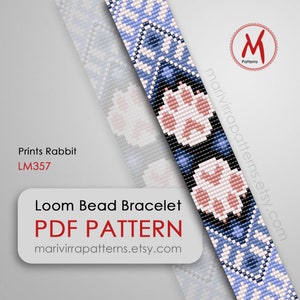 May include: A loom bead bracelet pattern featuring a blue, white, and pink design. The pattern is called "Prints Rabbit" and has the code LM357. The pattern is available as a PDF download from marivirrapatterns.etsy.com.