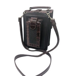 K&ouml;nnte beinhalten: Ein Set aus drei Keramikbechern mit gesprenkelter, matter Oberfl&auml;che. Die Becher sind in Creme-, Hellgrau- und Dunkelgraut&ouml;nen gehalten. Jeder Becher hat ein schlichtes, minimalistisches Design.