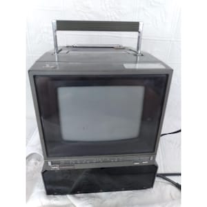 Monitor y grabador de video portátil MPO Videotronics VHS-764 vintage SOLO PARA REPUESTOS