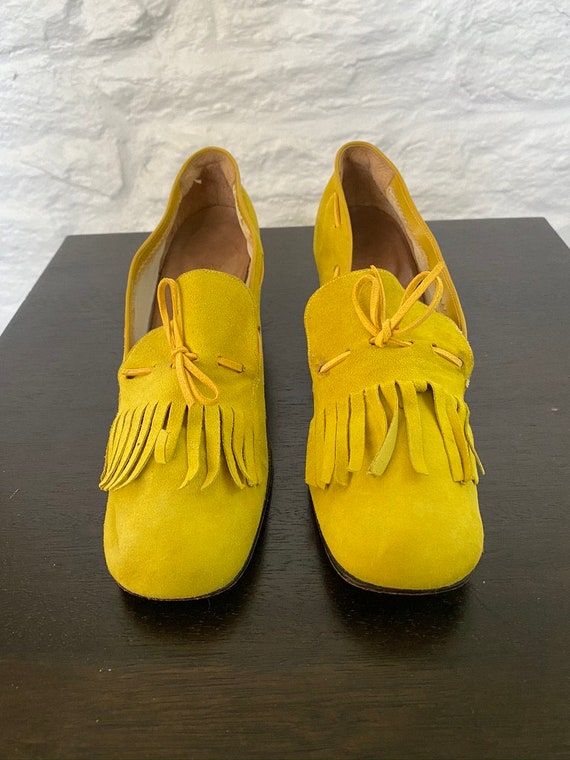suede fringed loafers