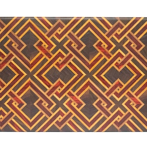 May include: A rectangular wooden cutting board with a geometric pattern made of different colored woods. The pattern is made of squares and rectangles, and the colors are brown, red, and yellow.