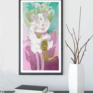 May include: A white Maneki-Neko, or lucky cat, with a gold coin and the Japanese character for 'fortune' on its paw. The cat is surrounded by pink and green floral designs and fish.