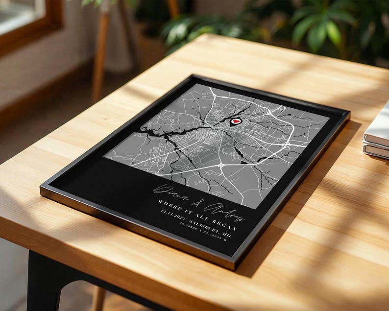 May include: A white ceramic mug with a black handle and the text "But First, Coffee" in a bold, black font. The mug is set against a blurred background, suggesting a cozy setting. The mug appears to be approximately 4 inches tall.