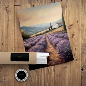 May include: A painting of a lavender field with a small white house in the distance. The field is in full bloom and the lavender is a vibrant purple. The sky is a soft blue with a few clouds. The painting is done in a realistic style.