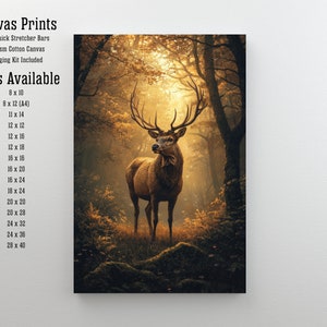 May include: A canvas print featuring a majestic red deer standing in a sun-dappled forest. The deer has large antlers and is looking directly at the viewer. The forest is filled with lush greenery and golden sunlight. The print is available in a variety of sizes, from 8x10 inches to 28x40 inches.