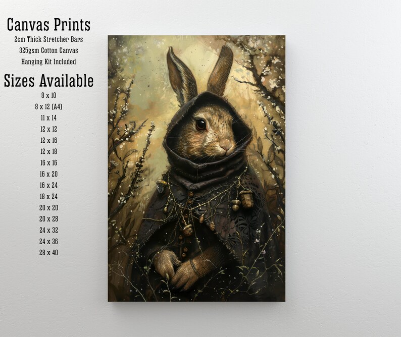 May include: Canvas print of a rabbit wearing a hooded cloak and adorned with acorns. The rabbit has brown fur and is set against a background of a snowy forest with branches and white blossoms.