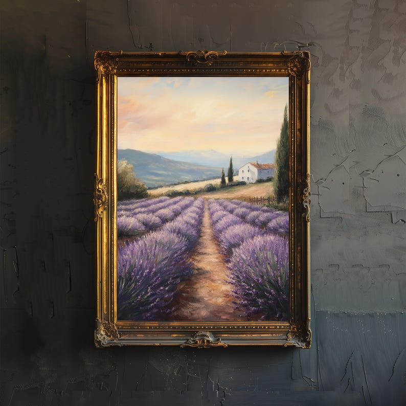May include: A framed oil painting depicting a lavender field with a small white house in the distance. The painting is set against a backdrop of rolling hills and a clear blue sky. The lavender flowers are in full bloom, creating a vibrant purple hue.