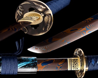 May include: A detailed image of a Japanese katana sword. The blade has a unique pattern of orange and blue hues. The hilt is wrapped in blue fabric, and the guard is gold with floral and leaf designs. The overall aesthetic is elegant and detailed.