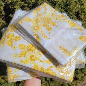 Vintage NOS queen sheet set and pillowcases with yellow floral design