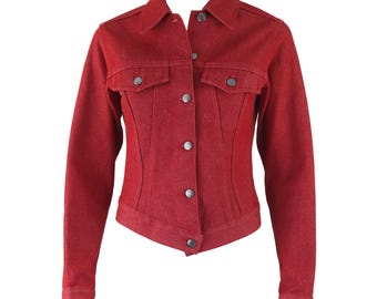 May include: A red denim jacket with a button closure and two front pockets.