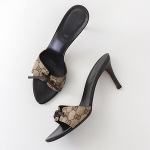 靴 Gucci Beige bow GG mules Vintage Gucci Beige Canvas GG Monogram Mules Leather Bow