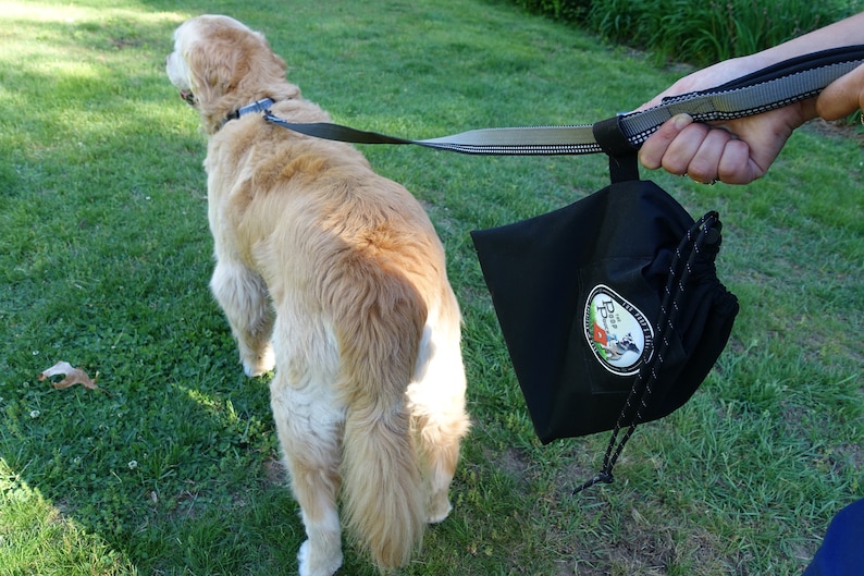 Poop bag carrier and dog waste carrier all in one. Premium Etsy