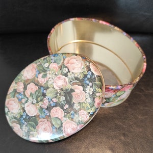 Vintage tin oval cookie box small size with floral design